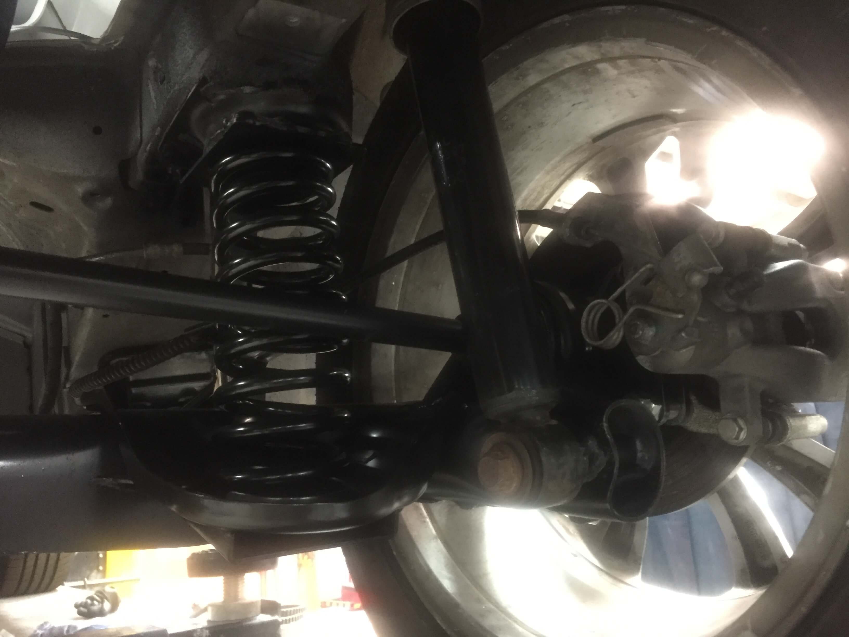 Bottom view of the rear suspension of a vehicle