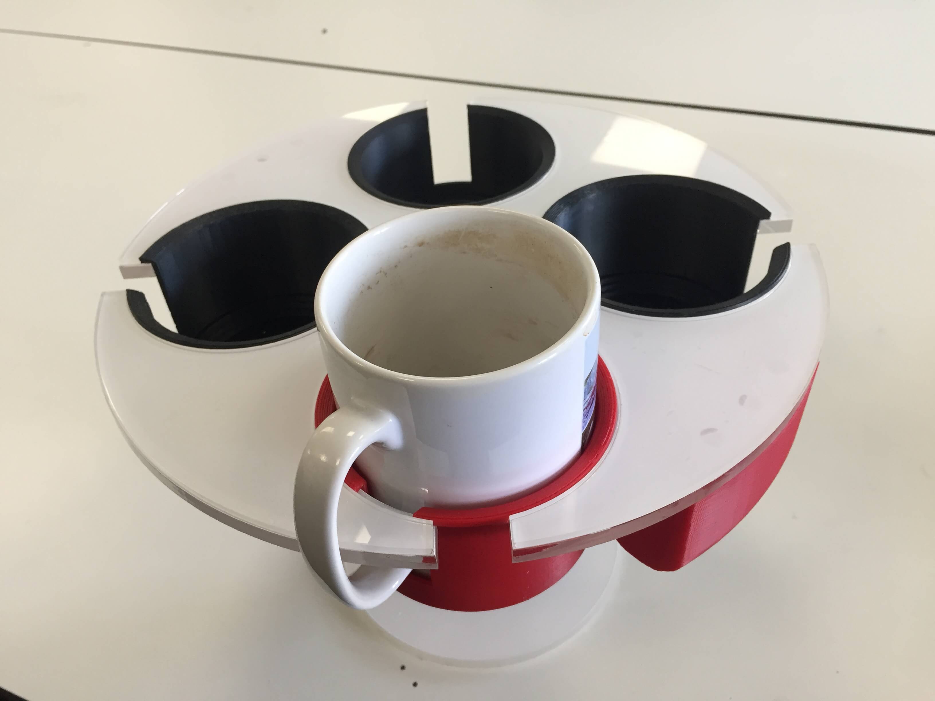 A mug being rotated to lock to the tray